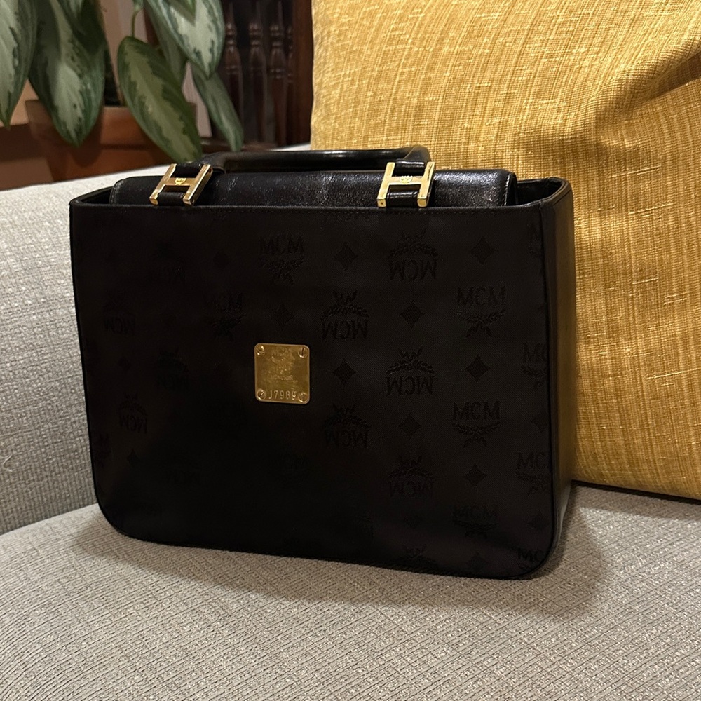 MCM Black Leather hand bag with Gold Accents. Made in Germany